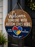 Someone With Autism Lives Here Door Hanger